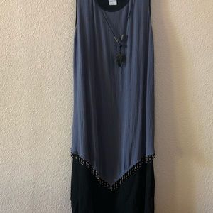 Boho? Ethnic? Dressy? This dress is all about the accessories. Drapes well.